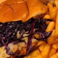 Buttermilk-Chicken Sandwich · Crispy buttermilk chicken, Pepper jack cheese, purple cabbage, lettuce, tomato, pickles, chi...