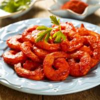 Exquisite Tandoori Shrimp · Seafood phenom! Shrimp marinated in chef's special spiced yogurt and herbs and cooked in cla...