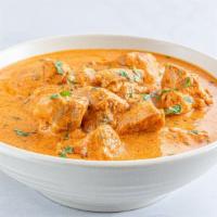 Butter Chicken · Traditional Indian chicken curry made with marinated boneless chicken in yogurt and a spice ...