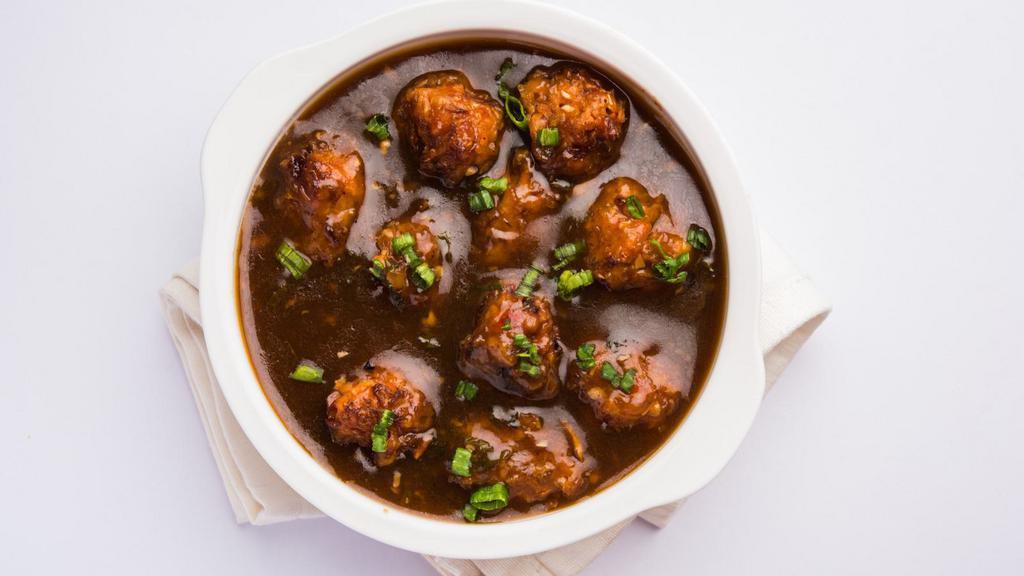 Vegetable Manchurian · Fried vegetable koftas with onions and chili garlic sauce.