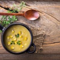 Sweet Corn Soup · Exquisite sweet corn soup with garlic chili stock broth.