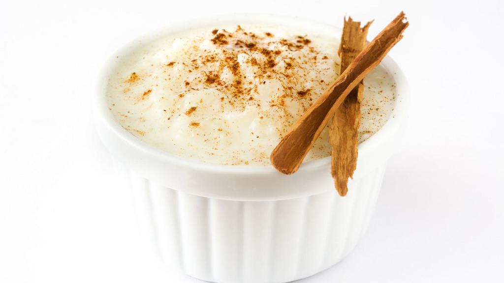 Rice Pudding · A fresh pudding made of caramelized and basmati rice, almonds, pistachio, raisins, cashews, and saffron.