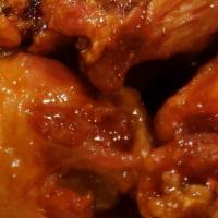 Wing It · Wings tossed in your choice of: buffalo, sriracha, teriyaki, bbq, dry-rubbed cajun, adobo, a...