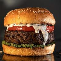 The Jani · Top seller. Black Angus, grass-fed, pasture-raised, prime ground beef patty, served on a ses...