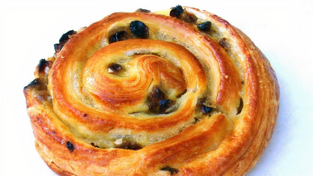 Pain Au Raisin (Raisin Bread) · Spiral-shaped flaky puff-pastry filled with custard cream and dried grapes raisins.