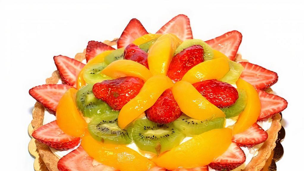 Tarte Aux Fruits (Fruit Tart)
 · Sweet tart dough filled with custard cream light and garnished with fresh sliced fruits.