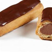 Éclairs Au Chocolat (Chocolate Eclair) · Long choux pastry filled with chocolate custard cream and coated with a chocolate icing.
