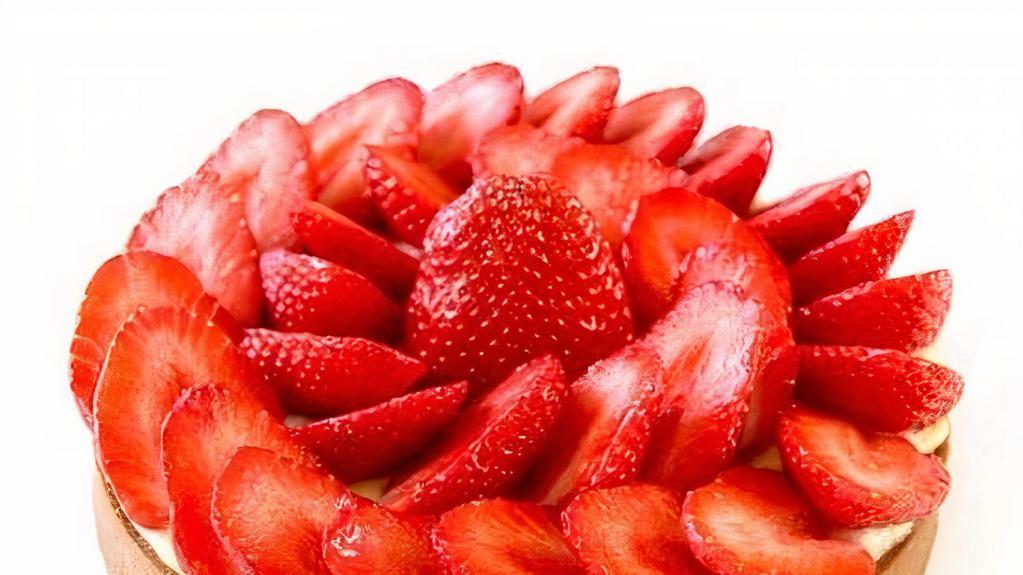 Tarte À La Fraise (Strawberry Tart)
 · Sweet tart dough filled with custard cream light and garnished with fresh strawberry slices.