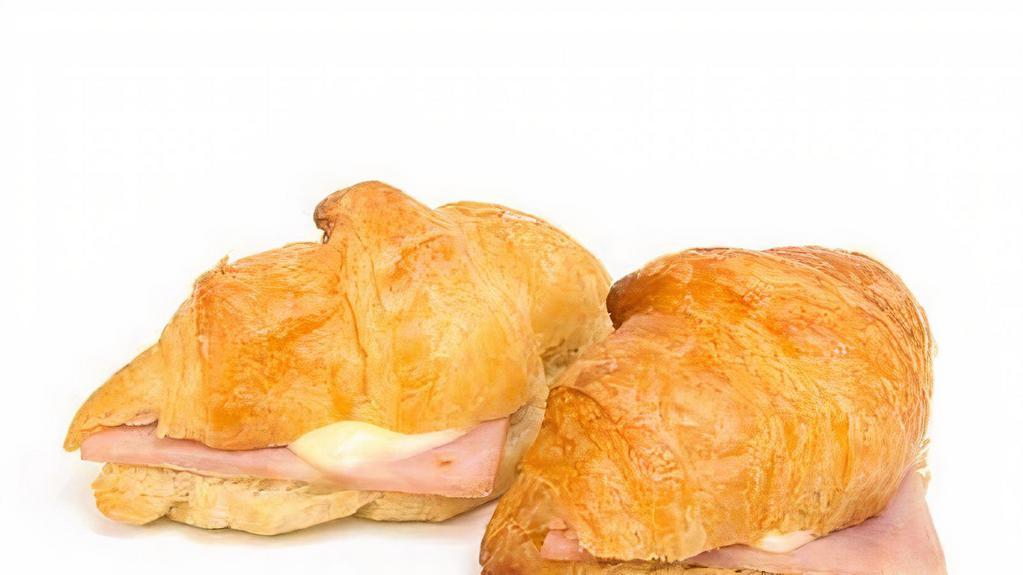 Croissant Au Jambon Fromage (Ham & Cheese Croissant)
 · Flaky all butter yeast puff-pastry dough, with ham and gruyere cheese freshly cut and prepared.