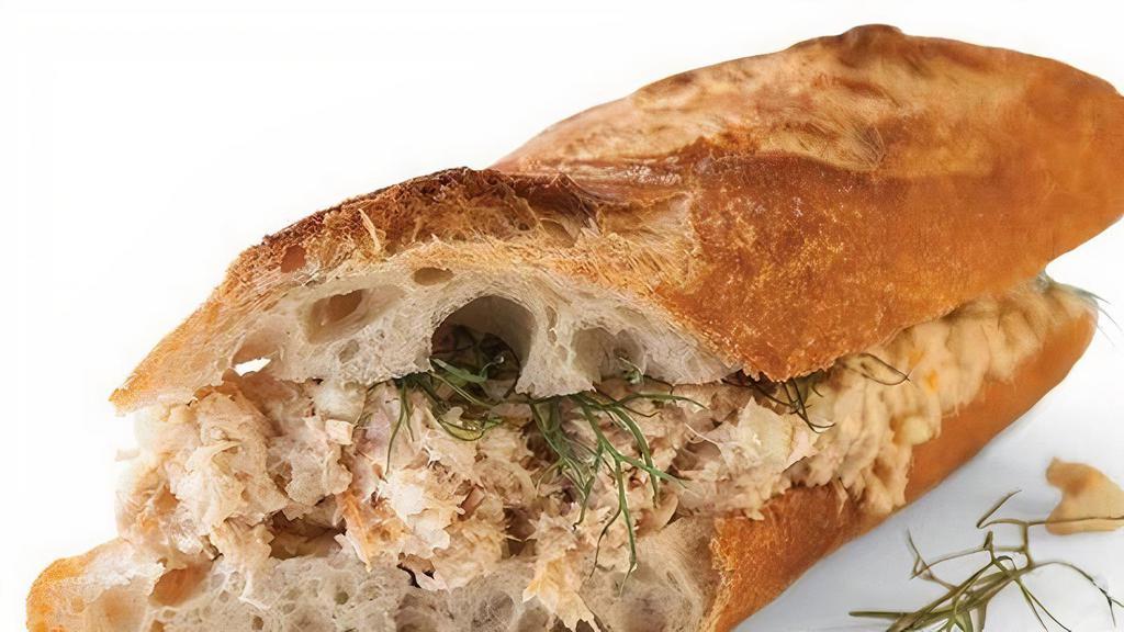 Niçois Tuna Sandwich
 · Fresh baguette with tuna, mayonnaise and black olives.