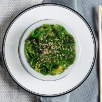 Seaweed Salad · Green seaweed and sesame seeds marinated in sweet and sour sauce.