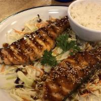 Salmon Teriyaki · Served with three pieces of gyoza steam rice edamame and salad.