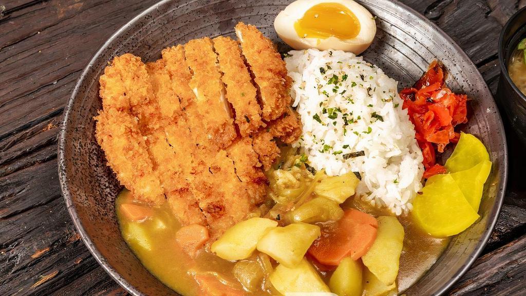 Pork Katsu Curry · Deep Fried Pork Cutlet with curry sauce.