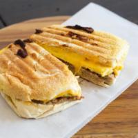 Sausage Egg & Cheese On A Croissant · Turkey sausage, egg, American cheese, served on a French croissant.Bacon, egg, American chee...