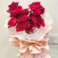 The Flowers Of Love · A blend of a dozen red roses with baby breath, paired with some green. A good choice of flow...