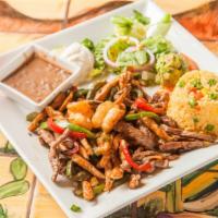 Fajitas Mixta · Grilled chicken, steak, shrimp onions, green, red peppers. Served with yellow rice, refried ...