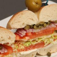 Sliced Nova Sandwich · Sliced smoked salmon, choice of cream cheese, and choice of bread. Lettuce, Tomato, and Onio...