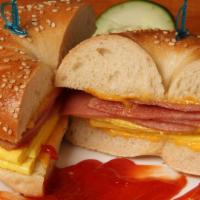 Egg, Meat & Cheese Sandwich · Two Eggs any style, choice of meat, choice of cheese, and your choice of bread.