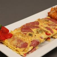 Western Omelet  · Three egg omelet with onions, peppers, and hebrew national salami. Served with side of bread...