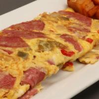 Italian Omelet · Three egg omelet with mushrooms, peppers, mozzarella cheese and onions. Served with side of ...