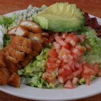 Cobb Salad · Breaded or grilled chicken with tomato, avocado, hard boiled egg, turkey bacon, and bleu che...