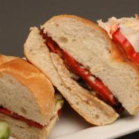 B. Grilled Chicken Sandwich · Grilled chicken with Mozzarella Cheese, roasted red peppers, and pesto. Comes with coleslaw ...