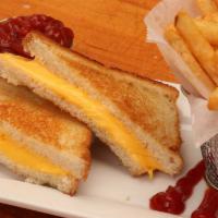 Grilled Cheese Sandwich · Served with French Fries and Pickles.