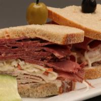 Turkey & Corned Beef Combo · Mouthwatering and only for the hungry. Includes coleslaw, Russian dressing, and a slice of p...