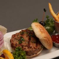 Turkey Burger · Our made in house Turkey Burger served with Fries and Pickles.