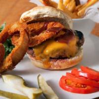 Cheddar Burger · Sautéed onions and mushrooms, melted cheddar, on a toasted bun. Served with French Fries and...