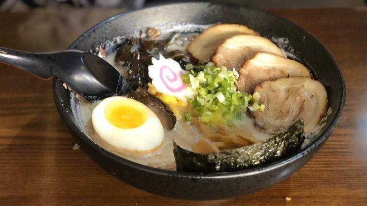 Classic Tonkotsu Ramen · Pork broth. Topped with braised pork belly, soft seasoned broiled egg, bamboo shoots,fish cake, roasted seaweed and fresh scallion.