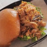 Pulled Chicken Sandwich · With mushrooms, greens with house KOVA sauce, served on a bun with hand cut fries.