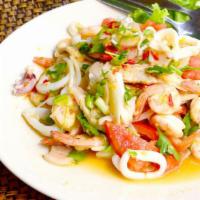 Mediterranean Shrimp And Crab Meat Salad · Large shrimp and crab meat salad over our garden salad, served with salad dressing.