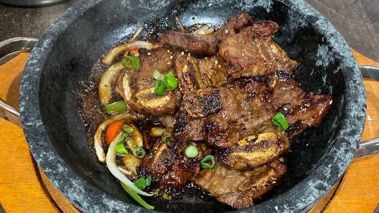 La 갈비구이 La Galbi Gui · Sweet garlic & onion soy sauce marinated grilled prime beef short ribs.