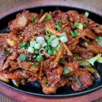 제육볶음 Jae Yook Bokum · Spicy marinated Berkshire pork shoulder stir-fried on a sizzling pan.
