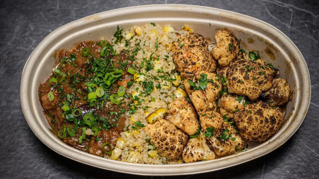 Tangy Tamarind Braised Eggplant · Served with chickpeas, blistered corn quinoa, and roasted cauliflower florets. Vegan, Gluten-Free, Dairy-Free