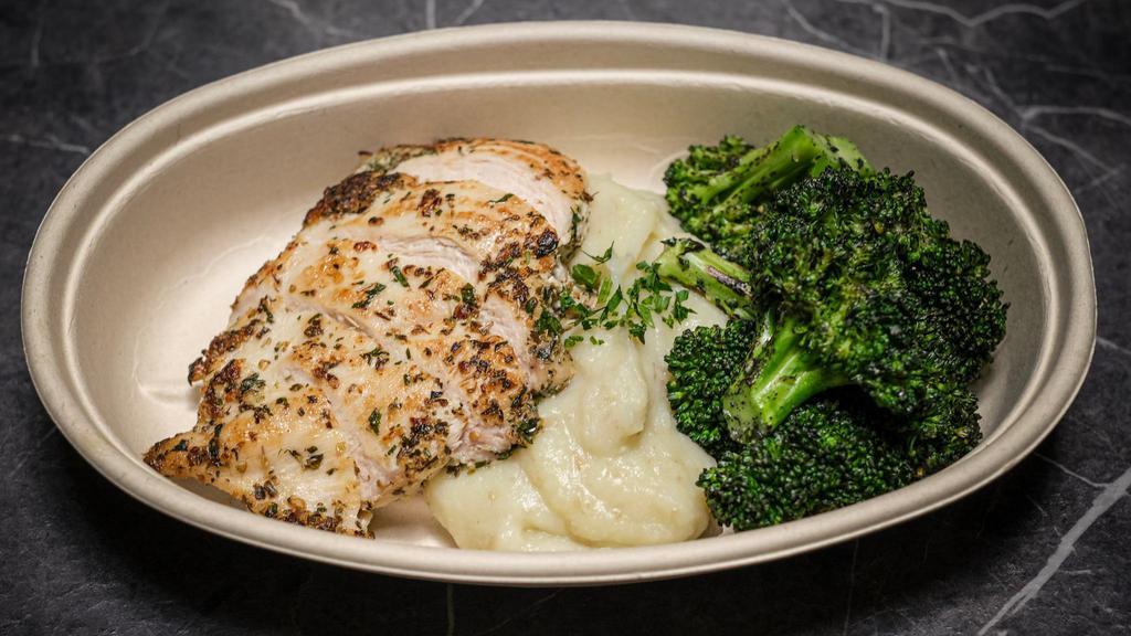 Herb Roasted Chicken · Served with mashed caulitatoes* and charred broccoli. Gluten-Free, Dairy-Free, Soy-Free
*a blend of cauliflower and potatoes