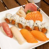 Sushi Sashimi Combo · 4 pieces of Sushi, 6 pieces of sashimi, and a choice of spicy tuna spicy salmon roll