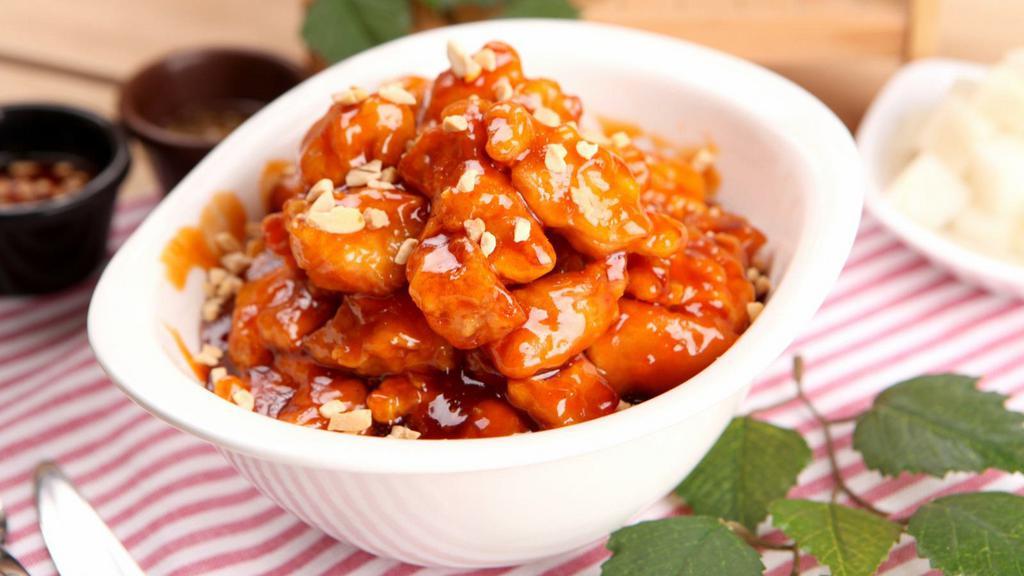 Sweet & Sour Chicken · Fresh tender pieces of boneless chicken, green peppers, and onions in sweet and sour sauce.