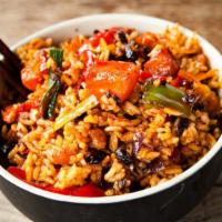 Chili Garlic Fried Rice · Sizzling traditional garlic flavored rice, served spicy.
