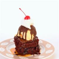 Hot Brownie Fudge With Ice Cream · Hot fudge brownie topped with vanilla ice cream.