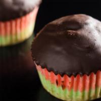 Rainbow Cookie · Inspired by the classic Italian rainbow cookie, this cupcake features almond cake dipped in ...
