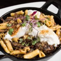 Braised Short Rib Cavatelli · Baked with mushrooms, pearl onions, and whipped ricotta.