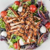 Cajun Chicken Salad · Fresh greens, pepperoni, tomatoes, fresh Mozzarella, Parmesan, onions, black olives, and vin...