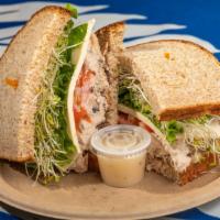 Tuna Melt · Popular. Mushrooms, tomatoes, melted cheese, carrots, lettuce, sprouts, papaya seed dressing.