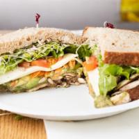 Manoa Delite · Popular and vegetarian. Avocado, mushrooms, tomatoes, melted cheese, carrots, lettuce, sprou...