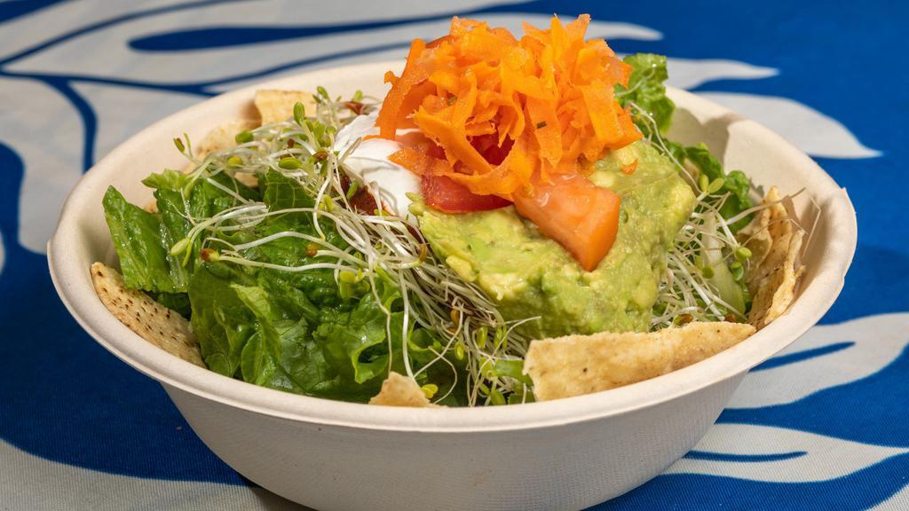 Papa Tostadas · Vegetarian. Chips, vegetarian filling, cheese, lettuce and sprouts, tomato, avocado, sauce, sour cream.