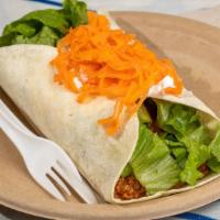 Burrito · Vegetarian. Vegetarian filling, cheese, lettuce, special sauce, sour cream and carrots.
