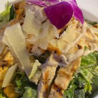 Traditional Caesar Salad · Romaine lettuce, Caesar dressing and herb croutons.