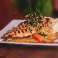 Grilled Chicken Breast · Served with mash potatoes.